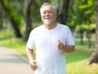 Elderly man briskly walking